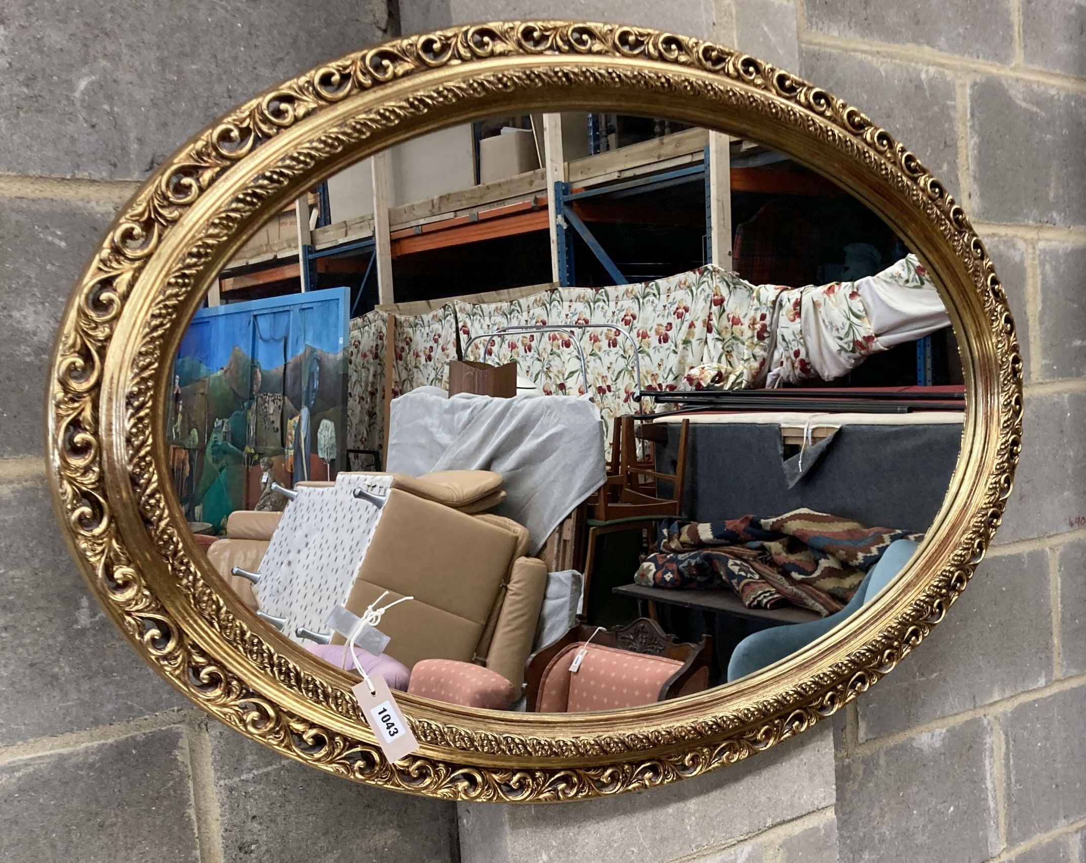 Two Victorian style oval gilt frame wall mirrors, larger 114cm, height 74cm